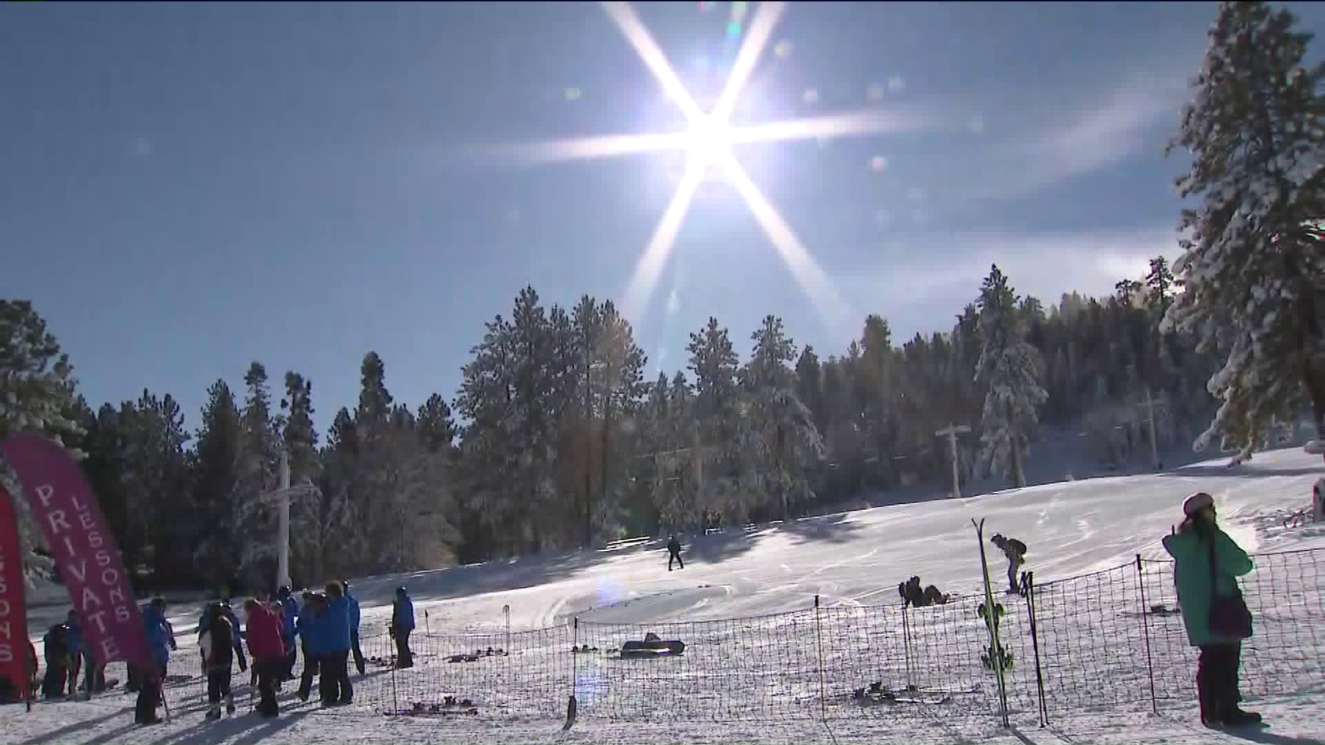 Skiers glide across the snow at Big Bear Mountain Resort on Nov. 30, 2019. (Credit: KTLA)