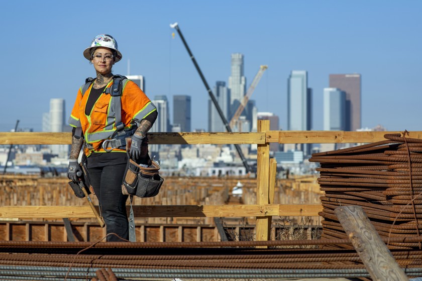 Rosa Garcia, a carpenter, is one of the many female construction workers involved in the 6th Street Bridge project over the Los Angeles River. She worked in retail before getting into construction in 2016. (Credit: Irfan Khan / Los Angeles Times)