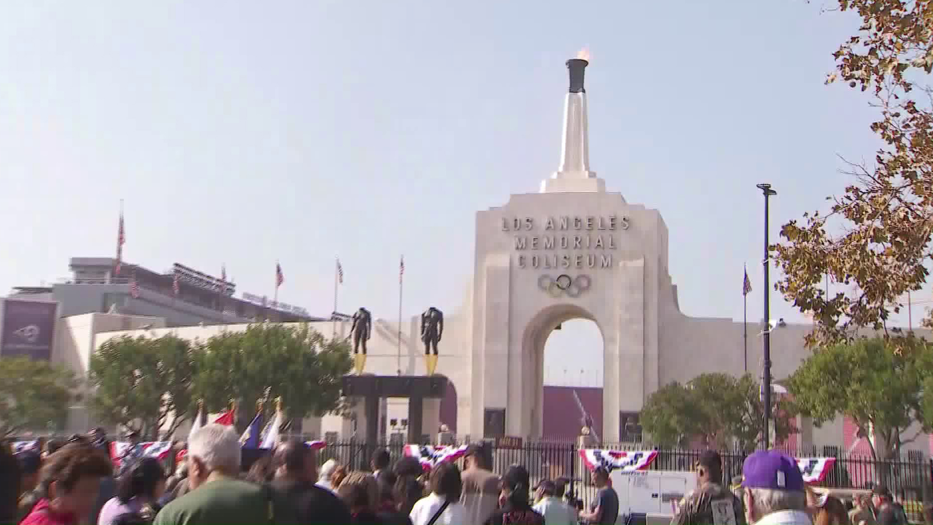 Locals gathered to mark Veterans Day at the Los Angeles Memorial Coliseum as the facility's historic torch was lit up on Nov. 11, 2019. (Credit: KTLA)