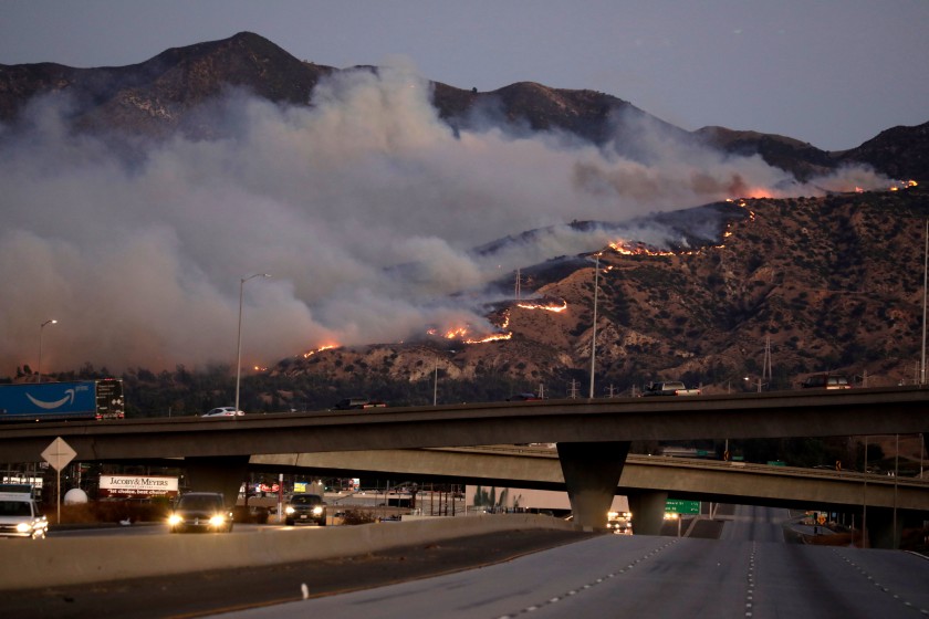 The Saddleridge Fire is seen after it broke out in Sylmar amid strong Santa Ana winds on Oct. 10, 2019. (Credit: Irfan Khan / Los Angeles Times)