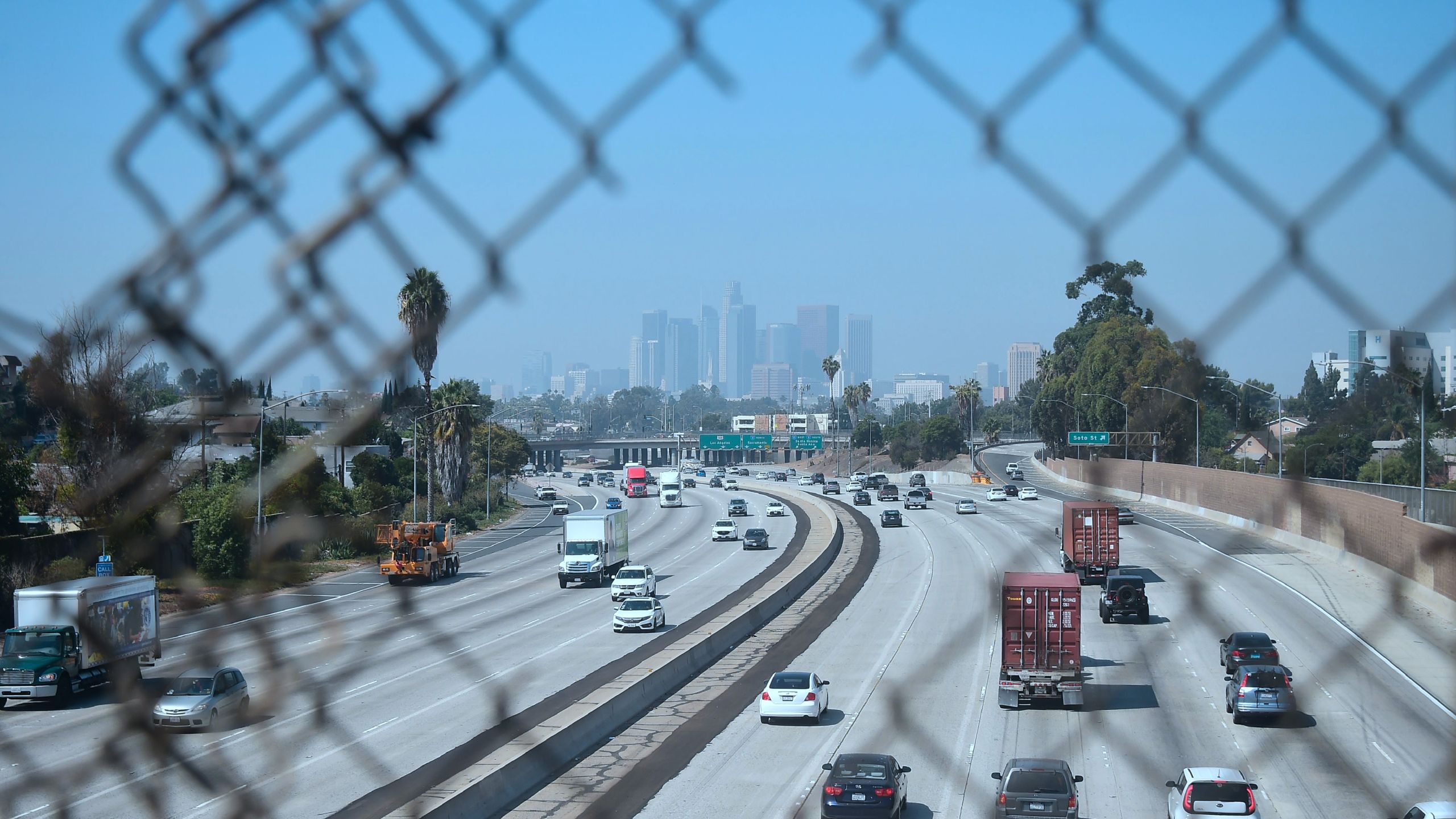 High-rise buildings in downtown Los Angeles are seen on on a hazy morning on Sept. 21, 2018. Eighty-seven days of smog made it the longest stretch of bad air in at least 20 years. (Credit: FREDERIC J. BROWN/AFP via Getty Images)