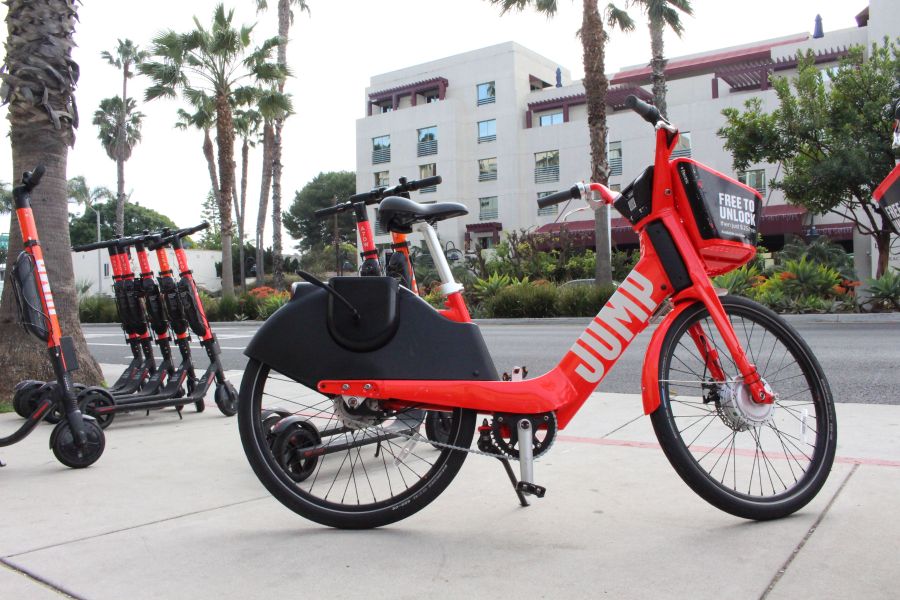 A Jump electric bicycle and scooters are seen near a road in Santa Monica Feb. 26, 2019. (GLENN CHAPMAN/AFP via Getty Images)