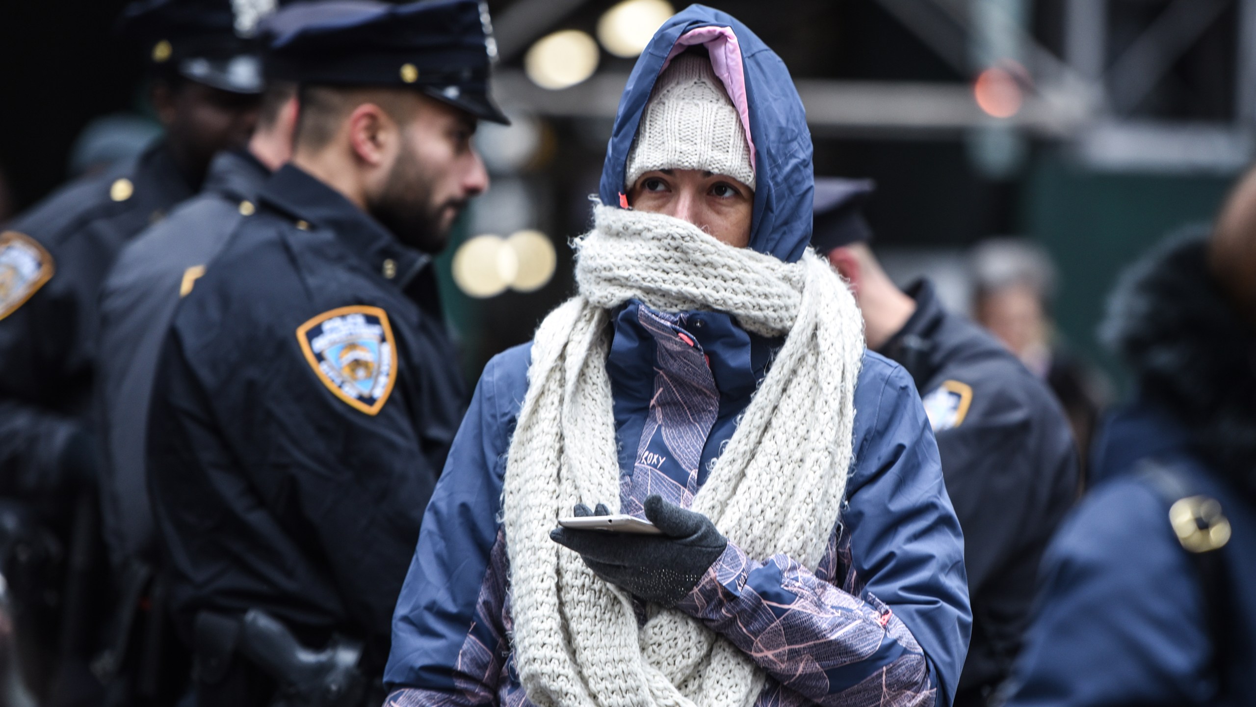 A person bundles up against the cold on November 12, 2019 in New York City. (Credit: Stephanie Keith/Getty Images)