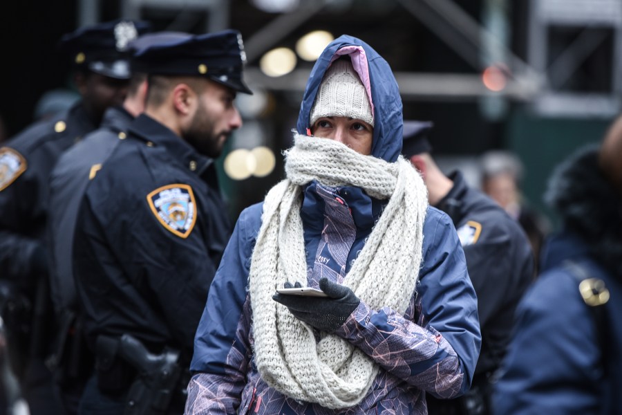 A person bundles up against the cold on November 12, 2019 in New York City. (Credit: Stephanie Keith/Getty Images)