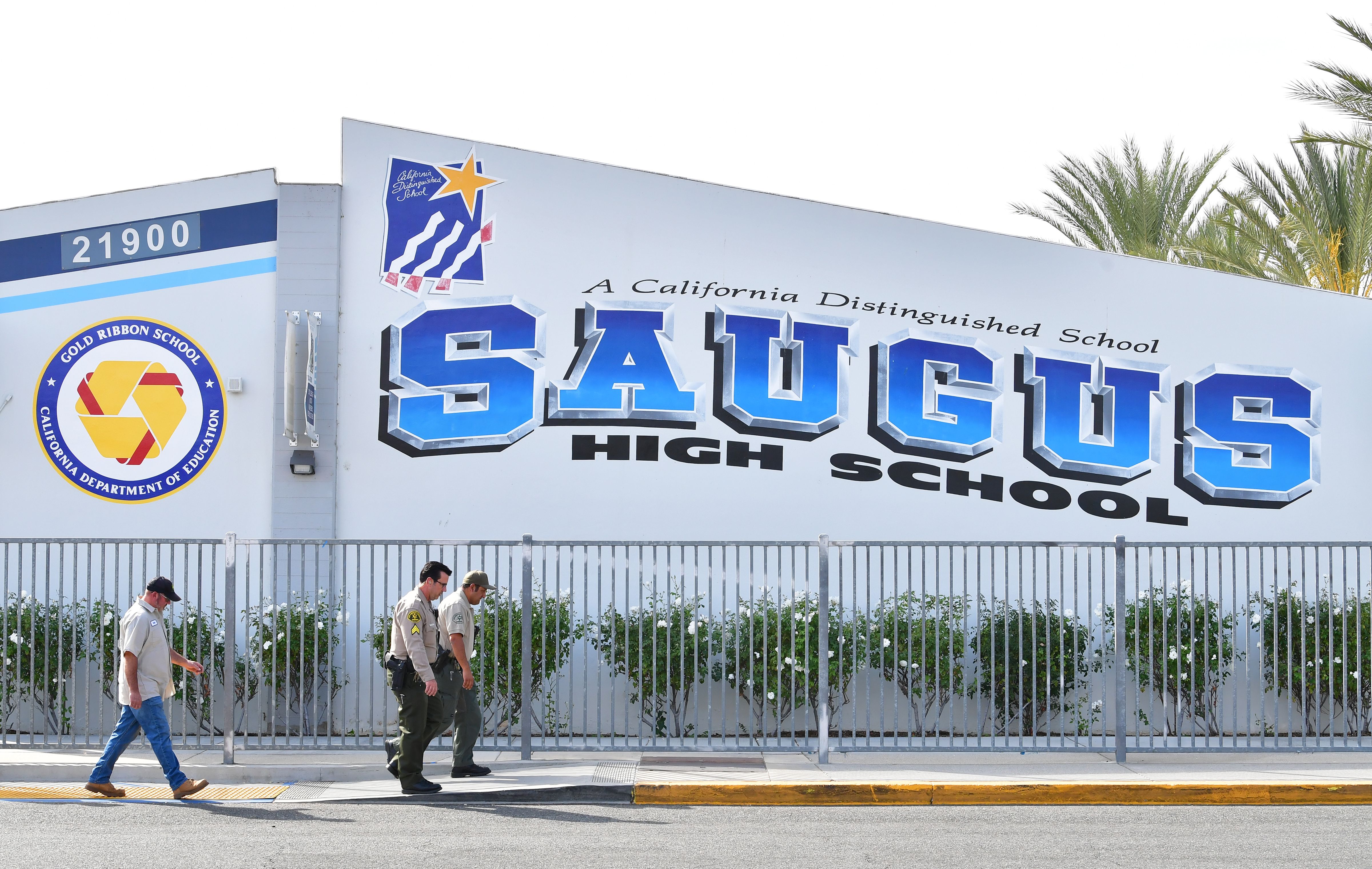 Law enforcement personnel are seen on campus at Saugus High School on Nov. 15, 2019, as the school remains closed a day after a shooting. (Frederic J. Brown / AFP / Getty Images)