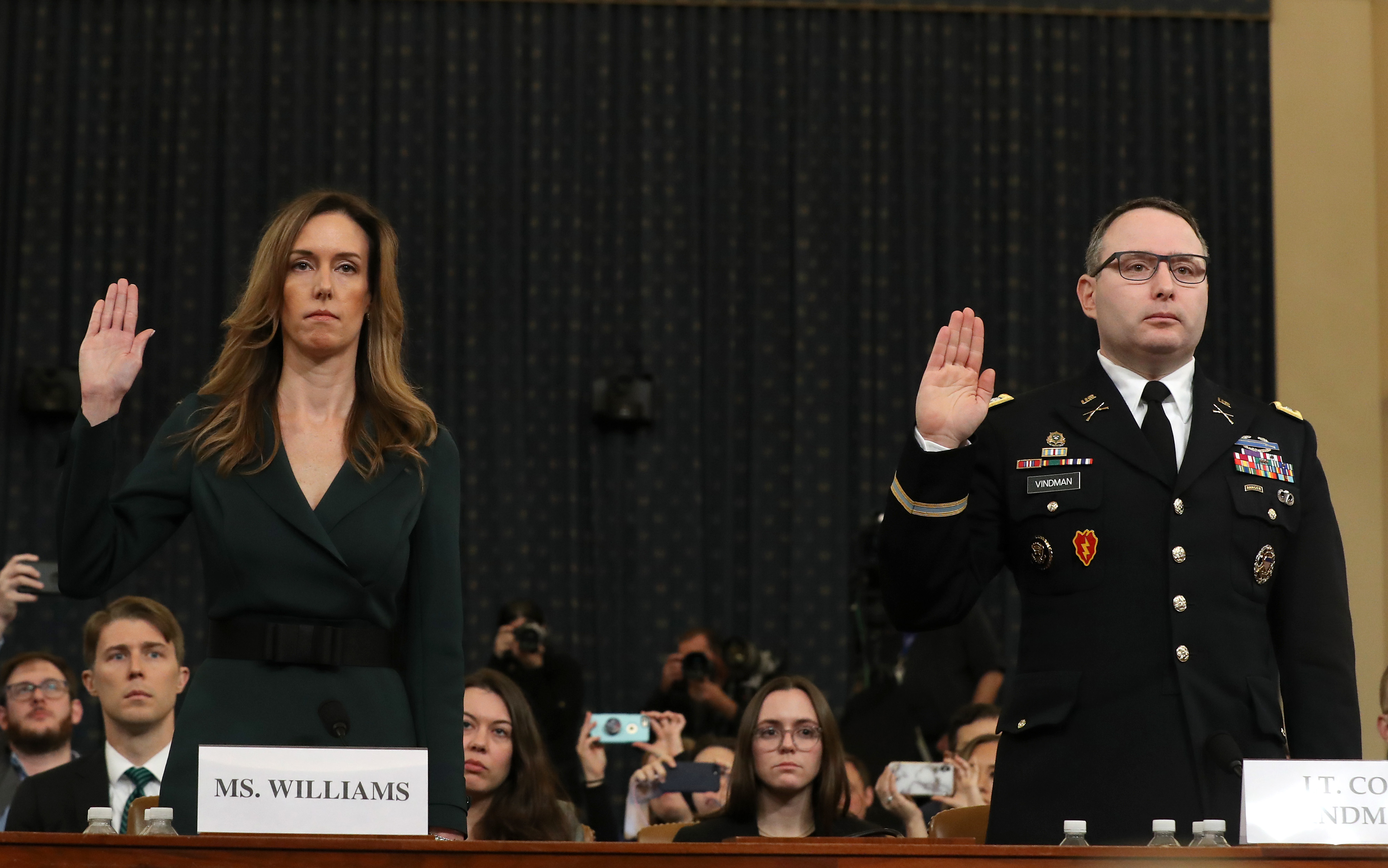 Jennifer Williams, adviser to Vice President Mike Pence for European and Russian affairs, and National Security Council Director for European Affairs Lt. Col. Alexander Vindman are sworn in to testify before the House Intelligence Committee in the Longworth House Office Building on Capitol Hill November 19, 2019. (Credit: Chip Somodevilla/Getty Images)