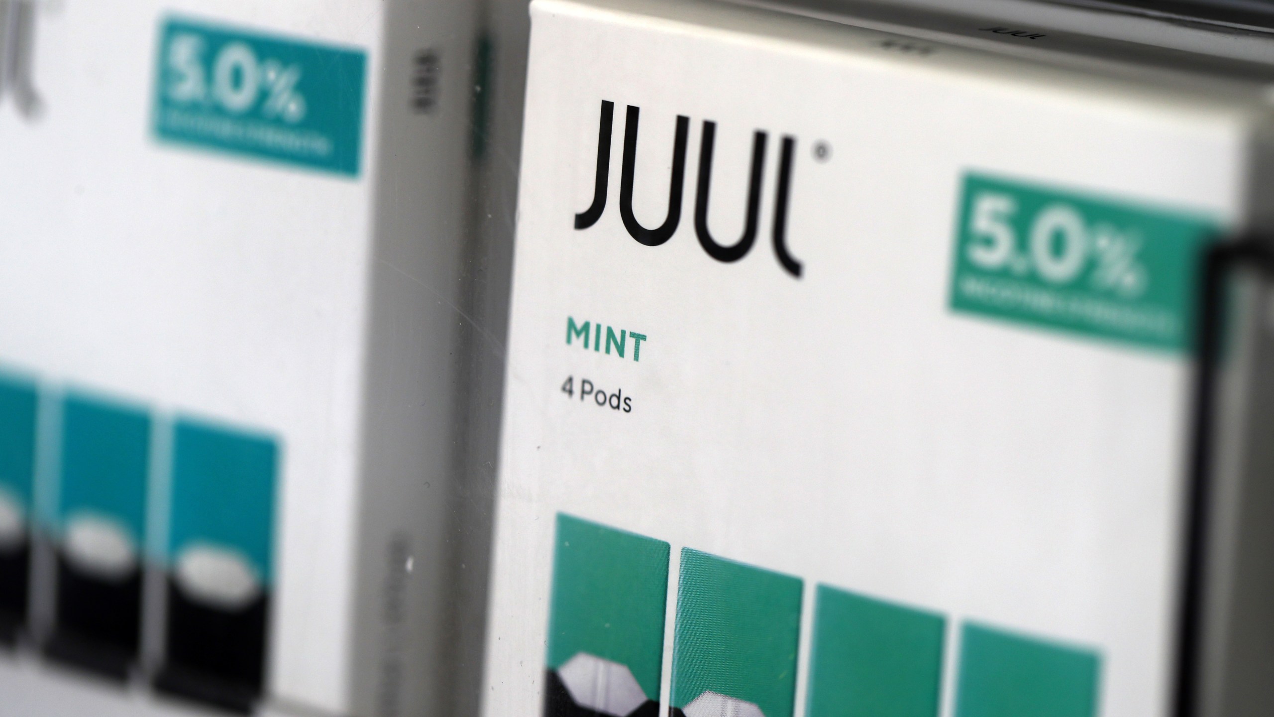 Packages of Juul mint flavored e-cigarettes are displayed at a smoke shop in San Rafael on Nov. 7, 2019. (Credit: Justin Sullivan / Getty Images)