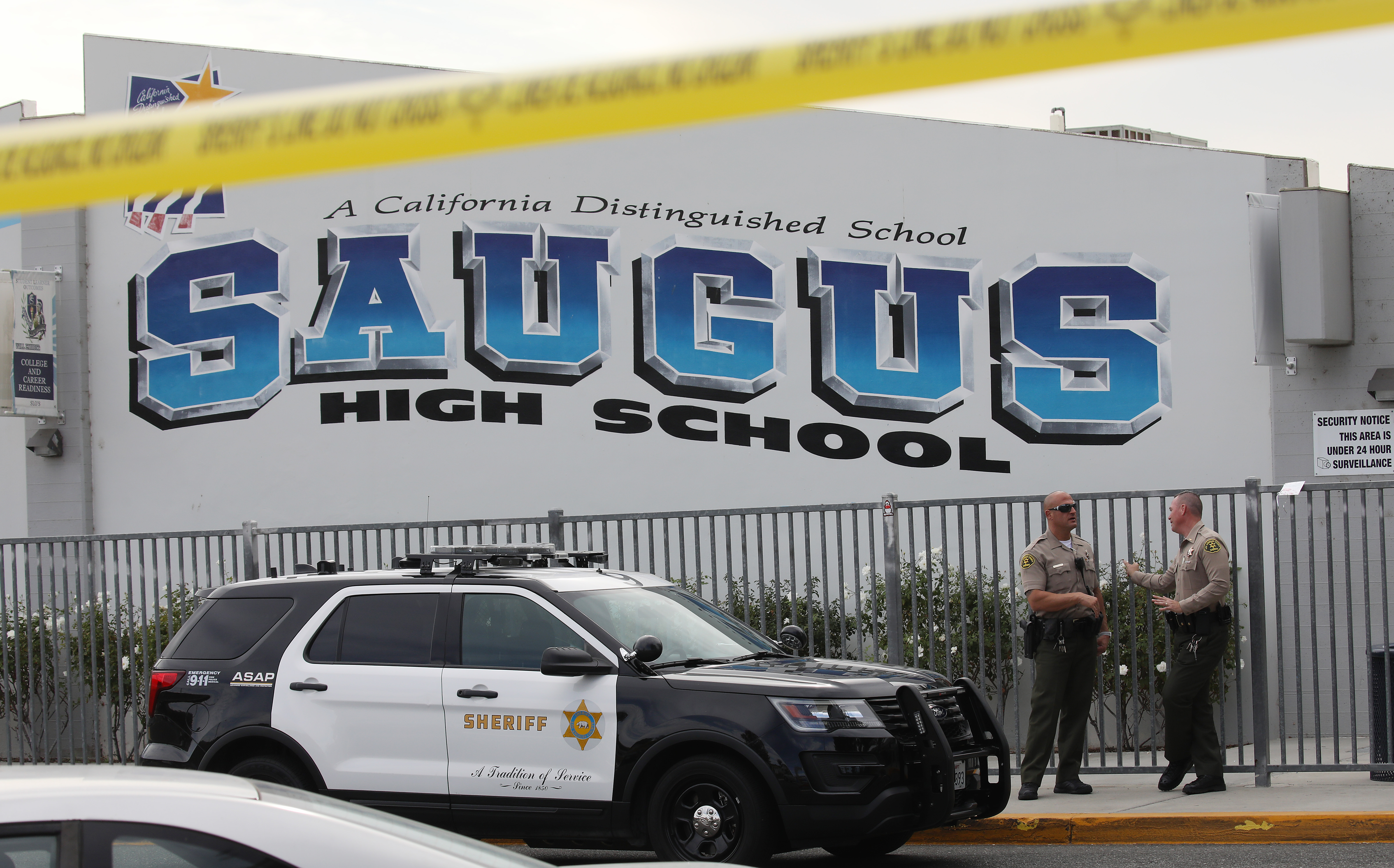 L.A. County sheriff's deputies are positioned at Saugus High School in Santa Clarita on Nov. 15, 2019, a day after a deadly shooting there. (Credit: Mario Tama/Getty Images)