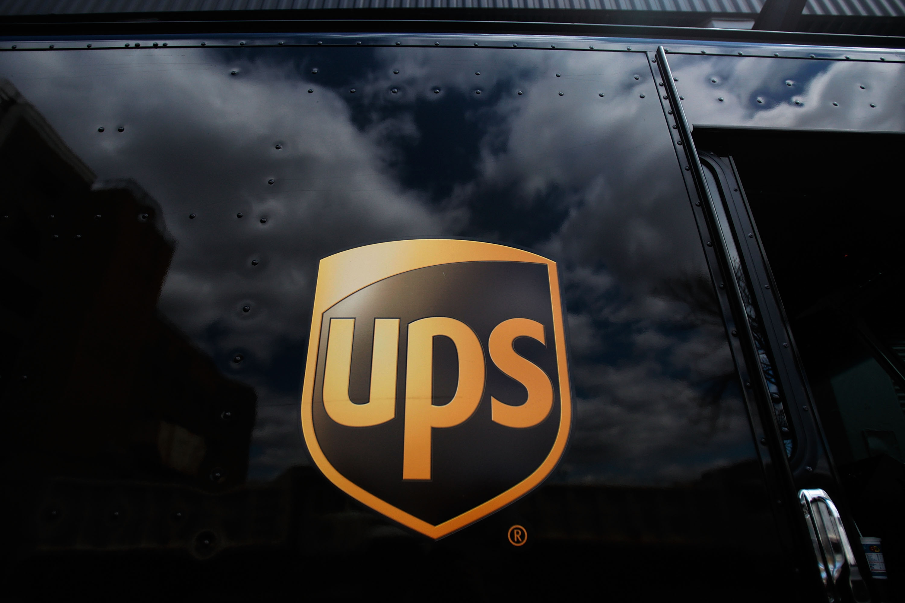 The United Parcel Service logo is emblazoned on the side of a delivery truck seen on April 23, 2009, in New York City. (Credit: Chris Hondros/Getty Images)