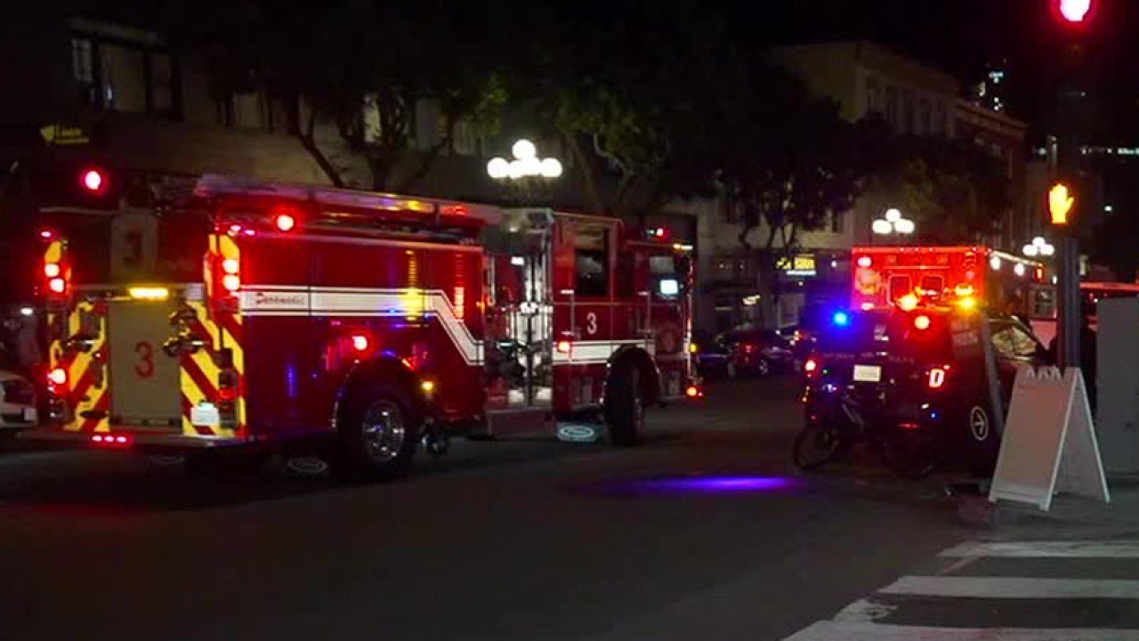 San Diego authorities respond to the scene of a brawl during a Halloween celebration in the Gaslamp Quarter. (Credit: KGTV via CNN)