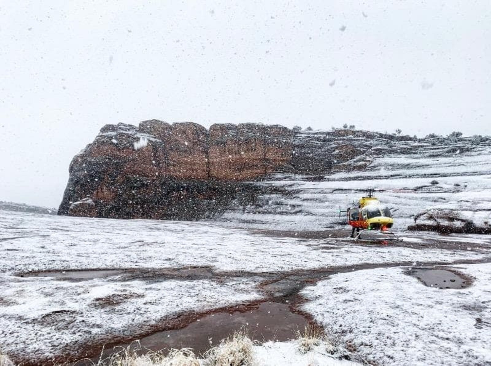 A rescue aircraft is seen after two people were killed and another was injured in a fall near Delicate Arch in Utah's Arches National Park on Nov. 29, 2019. (Credit: Utah Bureau Of Land Management via CNN)