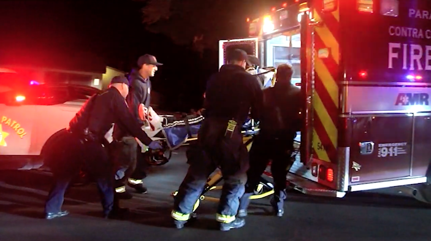 Paramedics transport a victim after a shooting at a party in Orinda on Oct. 31, 2019. (Credit: KRON)