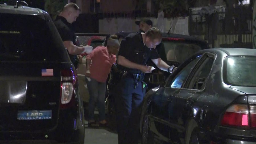 Police investigate a shooting that left two people wounded in the Vermont Knolls neighborhood of South Los Angeles on Nov. 22, 2019. (Credit: KTLA)