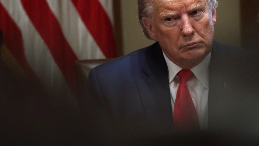 President Donald Trump listens during a listening session on youth vaping of electronic cigarette on Nov. 22, 2019, in the Cabinet Room of the White House in Washington, D.C. (Credit: Alex Wong/Getty Images)