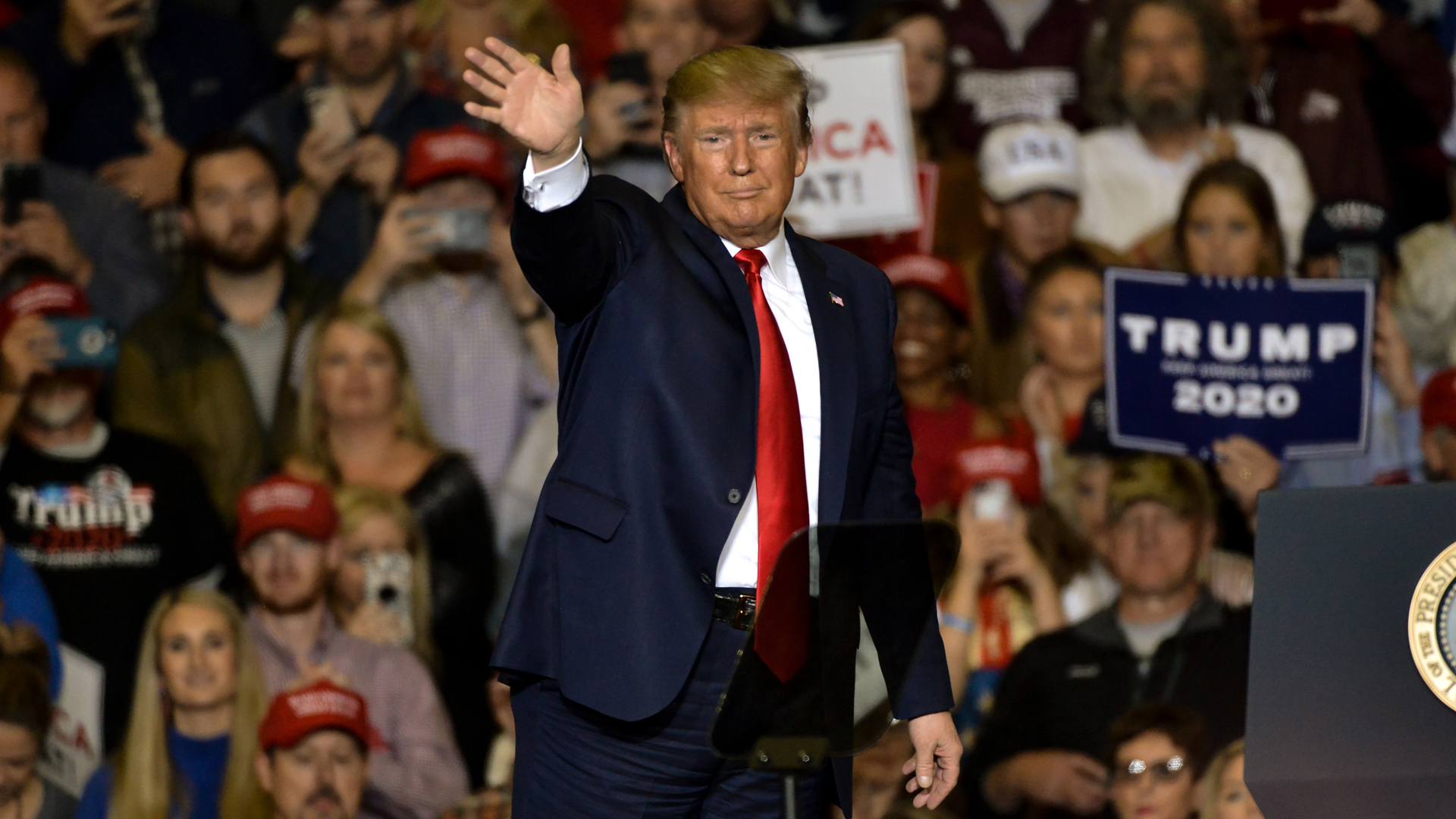 President Donald Trump waves during a "Keep America Great" campaign rally at BancorpSouth Arena on November 1, 2019 in Tupelo, Mississippi. Trump is campaigning in Mississippi ahead of the state's gubernatorial election where Republican candidate Tate Reeves is in a close race with Democrat Jim Hood. (Credit: Brandon Dill/Getty Images)