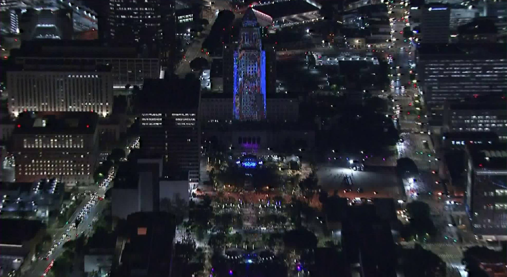 L.A.'s City Hall is lit up for the New Year's celebration at Grand Park on Dec. 31, 2019. (Credit: KTLA)