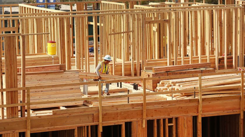 Workers build the Metro Villas, a supportive housing community in East Hollywood, in April 2019. (Credit: Al Seib / Los Angeles Times)