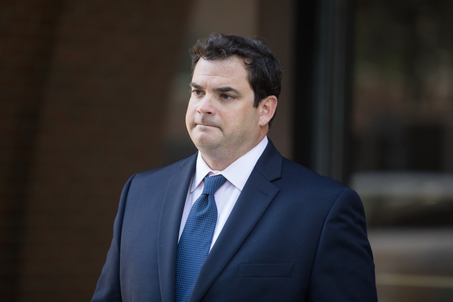 Former Stanford University sailing coach John Vandemoer leaves a federal courthouse in Boston following his sentencing on June 12, 2019. (Credit: Scott Eisen / Getty Images)