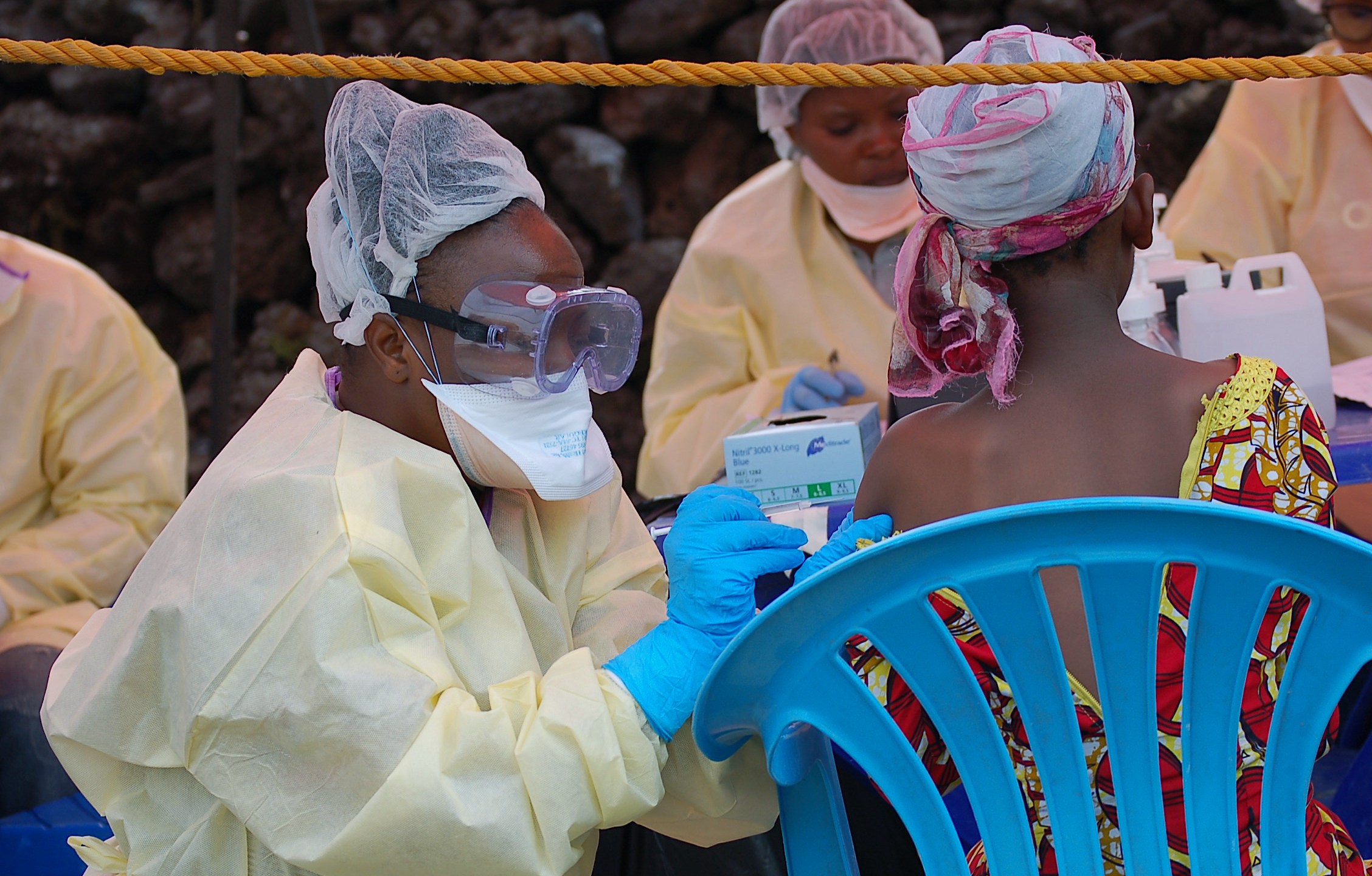 A girl receives a vaccine against Ebola from a nurse in Goma in the Democratic Republic of the Congo on Aug. 7, 2019. (Credit: Augustin Wamenya / AFP / Getty Images)