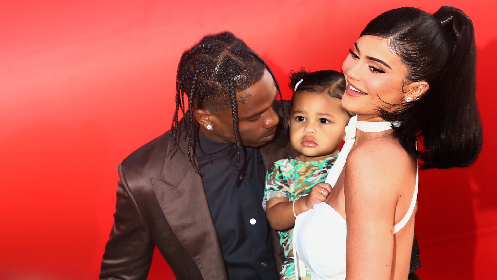 Travis Scott and Kylie Jenner attend an event with their daughter on Aug. 27, 2019, in Santa Monica. (Credit: Tommaso Boddi/Getty Images for Netflix)