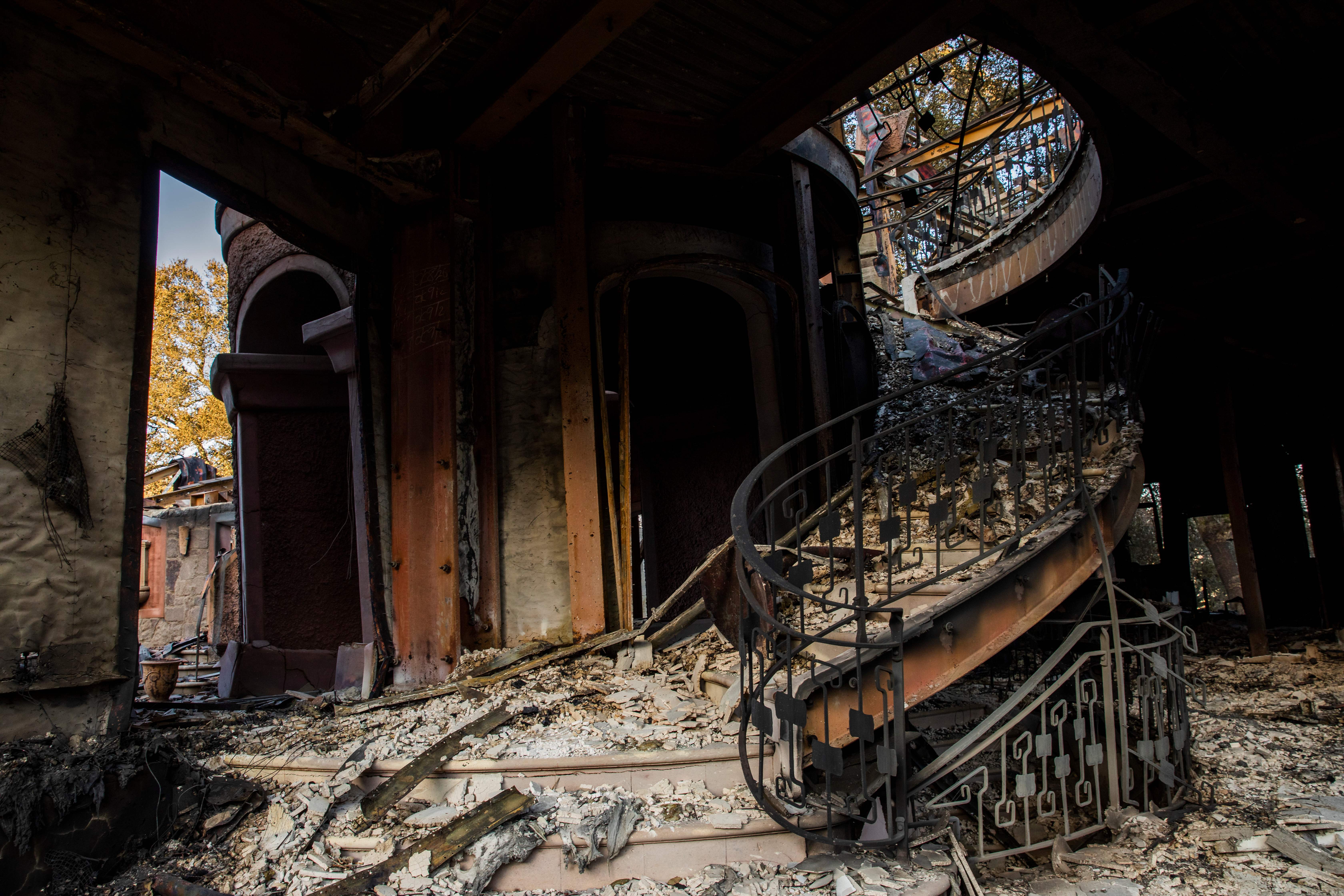 A structure devastated by the Kincade Fire off Briggs Ranch Road in Kellogg is seen on Oct. 31, 2019. (Credit: Philip Pacheco / AFP / Getty Images)