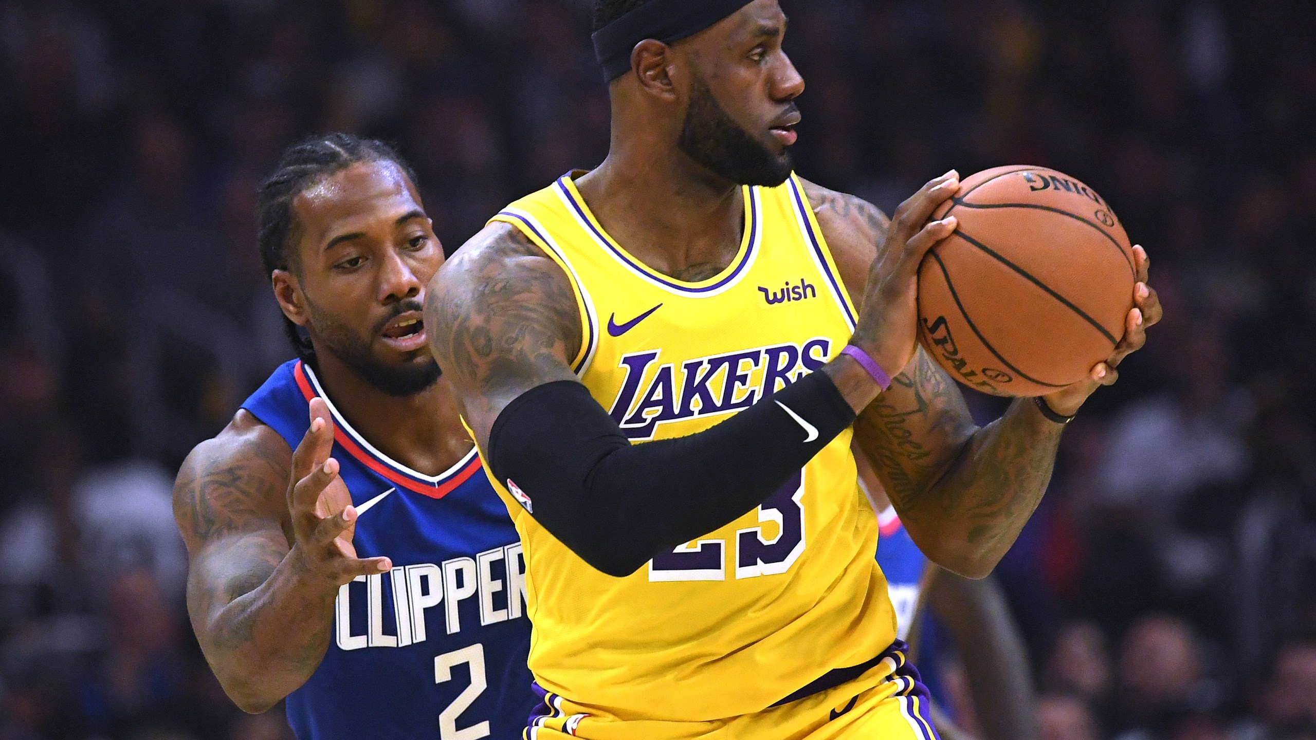 Kawhi Leonard and LeBron James play at Staples Center on Oct. 22, 2019. (Harry How/Getty Images)