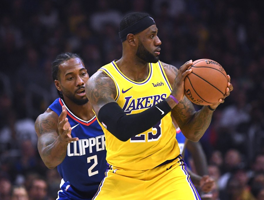 Kawhi Leonard and LeBron James play at Staples Center on Oct. 22, 2019. (Harry How/Getty Images)