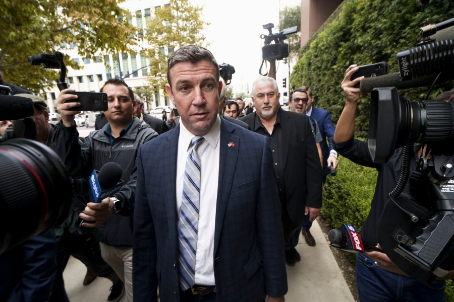 Rep. Duncan Hunter walks into a federal courthouse in San Diego on Dec. 3, 2019. (Credit: Sandy Huffaker / Getty Images)