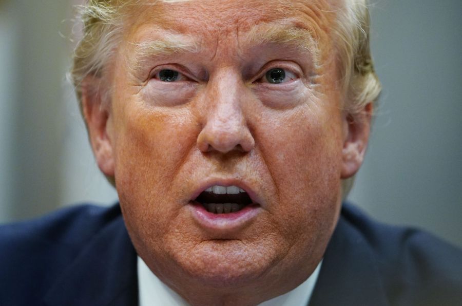 U.S. President Donald Trump speaks during a round table discussion on business and red tape reduction in the Roosevelt Room of the White House in Washington, D.C. on Dec. 6, 2019. (Credit: MANDEL NGAN/AFP via Getty Images)