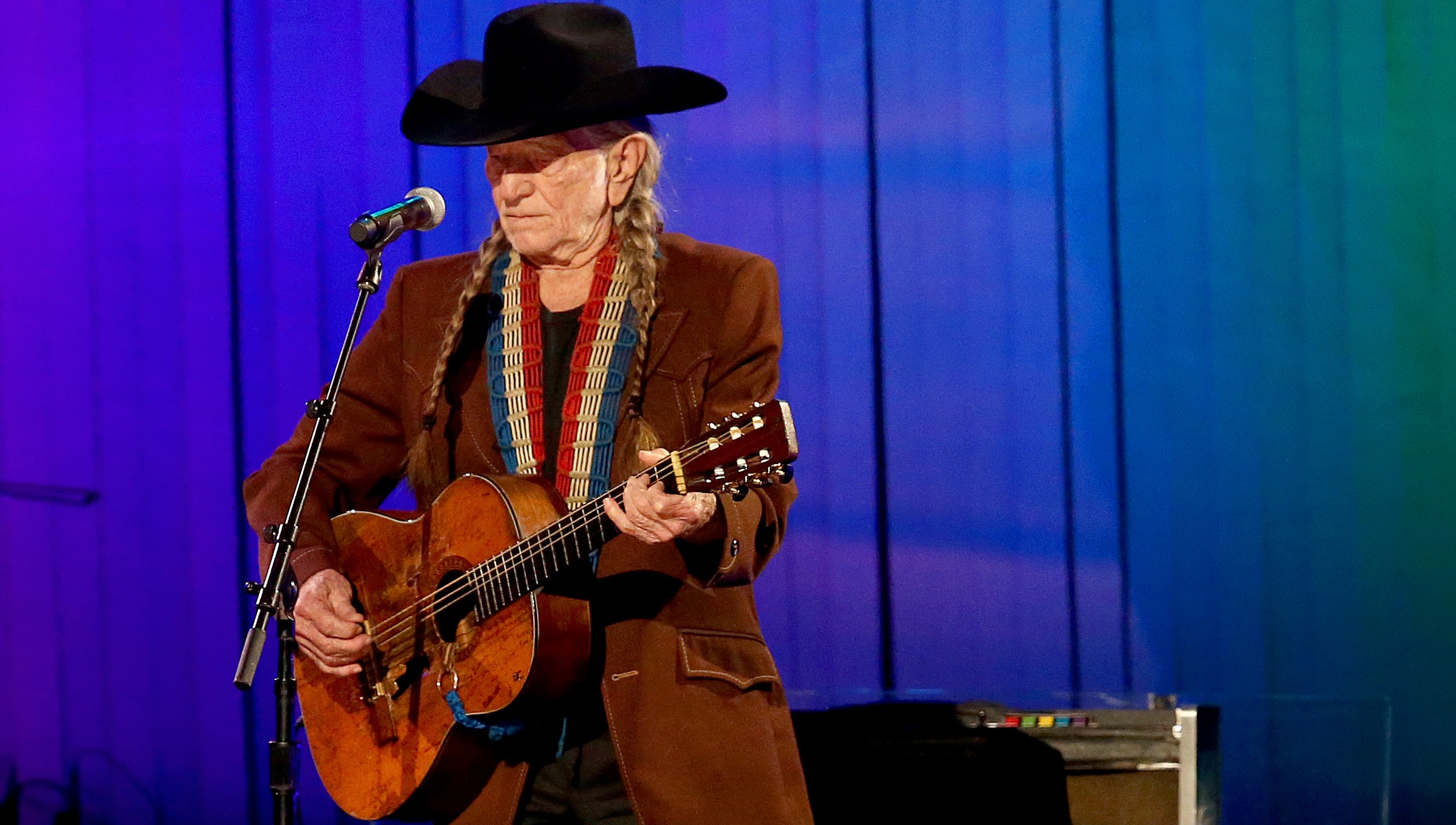 Willie Nelson performs onstage during the 53rd annual CMA Awards at the Bridgestone Arena on November 13, 2019 in Nashville, Tennessee. (Credit: Terry Wyatt/Getty Images,)