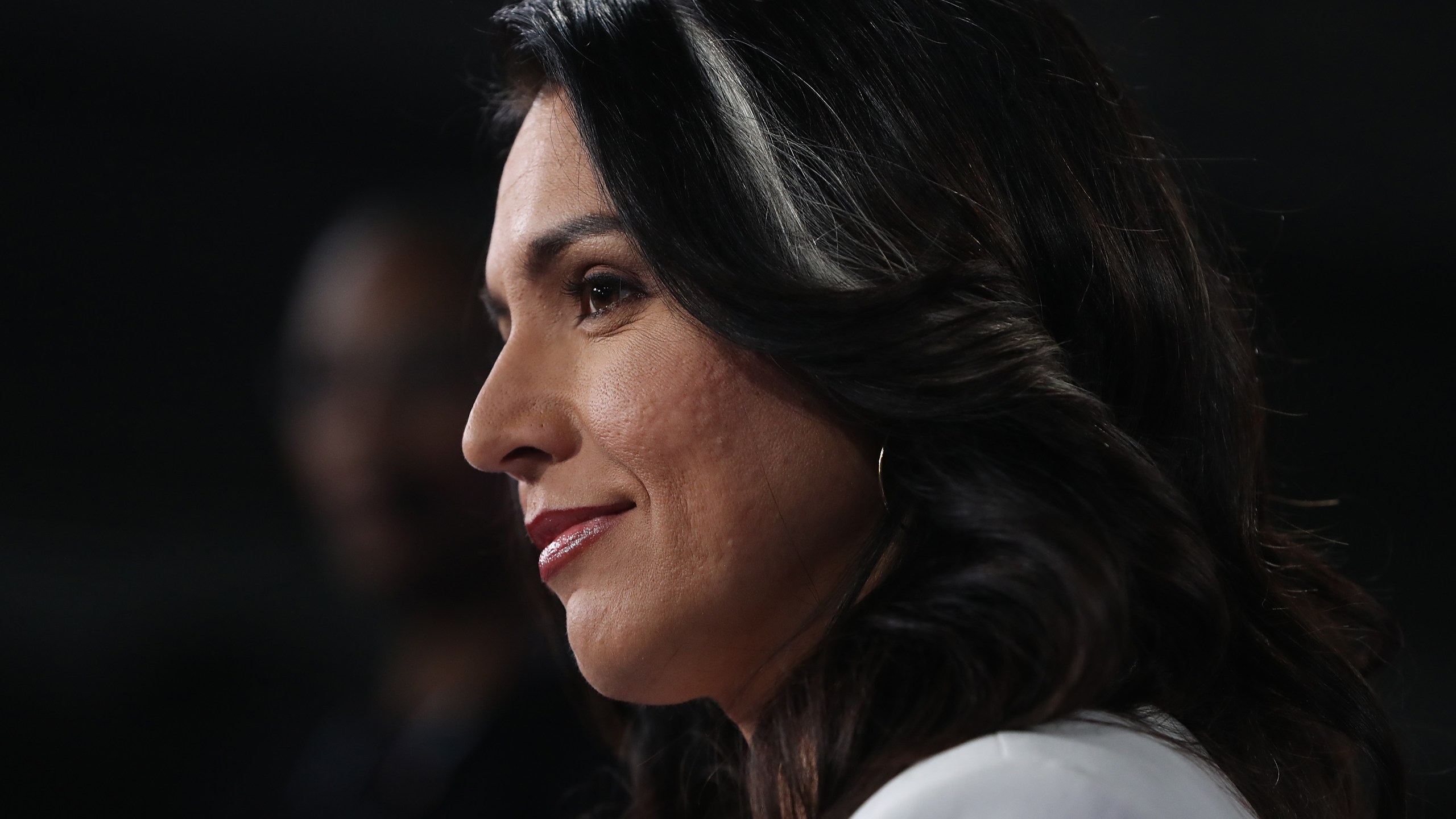 Rep. Tulsi Gabbard (D-HI) speaks to the media after the Democratic presidential debate at Tyler Perry Studios on Nov. 20, 2019 in Atlanta, Georgia. (Credit: Joe Raedle/Getty Images)