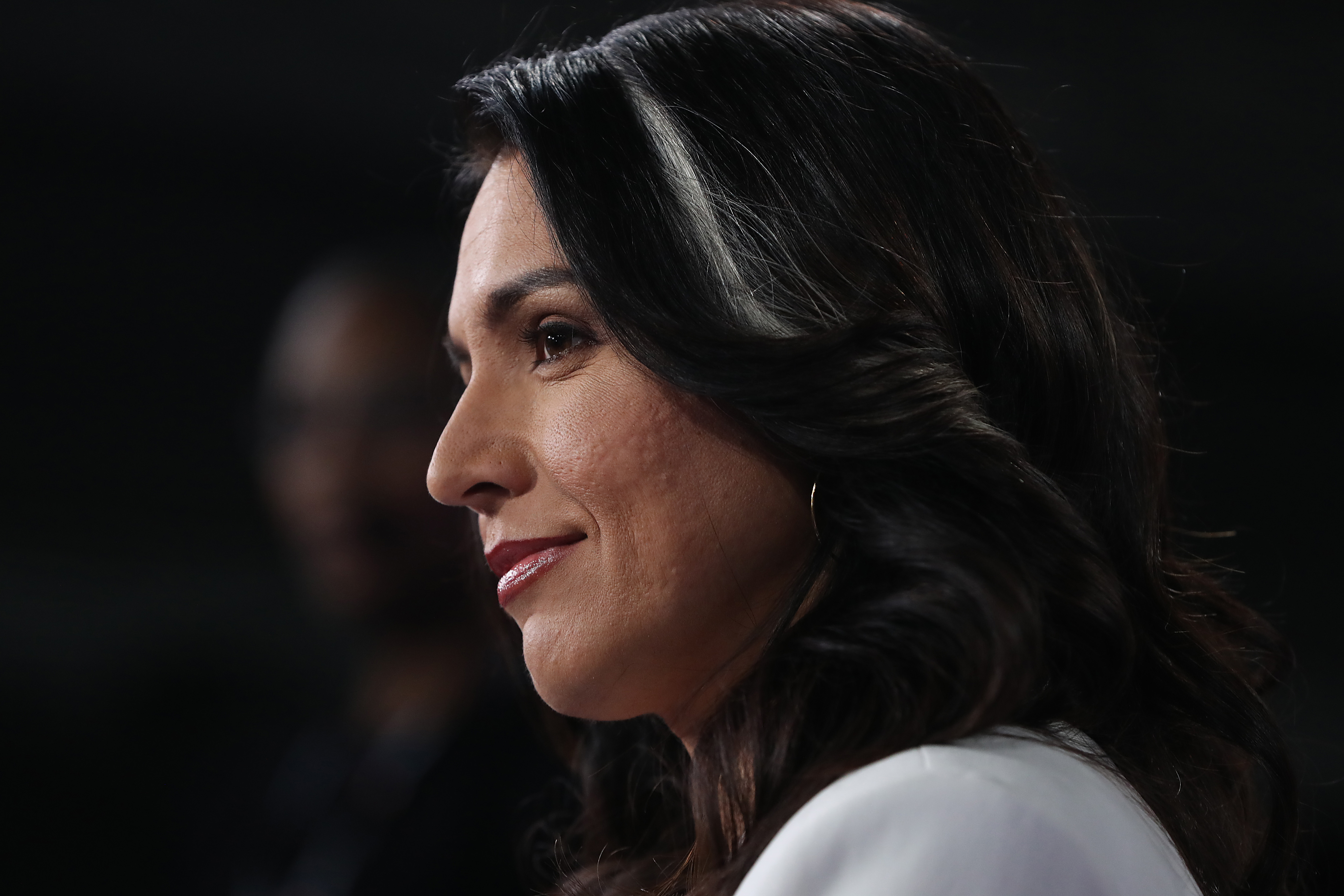 Rep. Tulsi Gabbard (D-HI) speaks to the media after the Democratic presidential debate at Tyler Perry Studios on Nov. 20, 2019 in Atlanta, Georgia. (Credit: Joe Raedle/Getty Images)