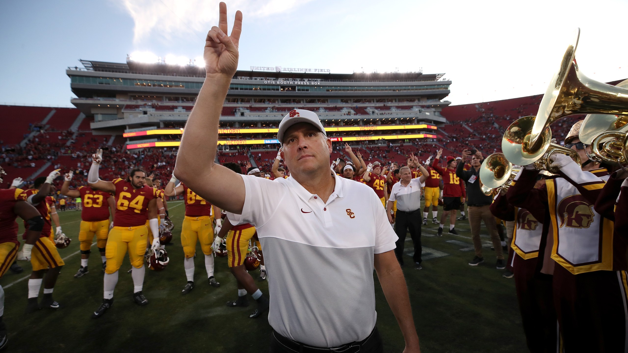 USC Trojans head coach Clay Helton waves to fans after defeating the UCLA Bruins 52-35 at Los Angeles Memorial Coliseum on Nov. 23, 2019. (Credit: Sean M. Haffey / Getty Images)