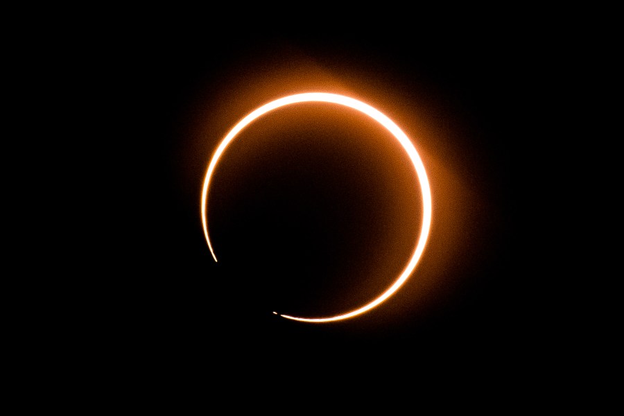 The moon moves in front of the sun in a rare "ring of fire" solar eclipse as seen from Tanjung Piai, Malaysia on December 26, 2019. (Credit: SADIQ ASYRAF/AFP via Getty Images)