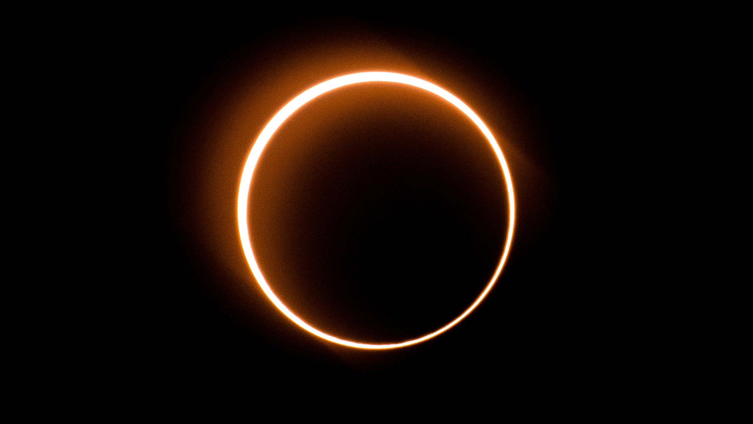 The moon moves in front of the sun in a rare "ring of fire" solar eclipse as seen from Tanjung Piai, Malaysia on December 26, 2019. (Credit: SADIQ ASYRAF/AFP via Getty Images)