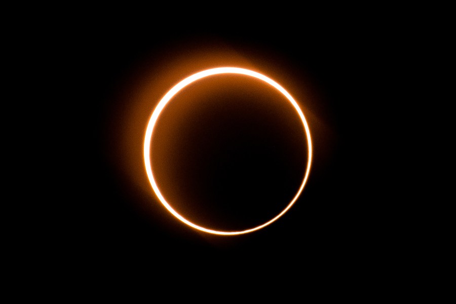 The moon moves in front of the sun in a rare "ring of fire" solar eclipse as seen from Tanjung Piai, Malaysia on December 26, 2019. (Credit: SADIQ ASYRAF/AFP via Getty Images)