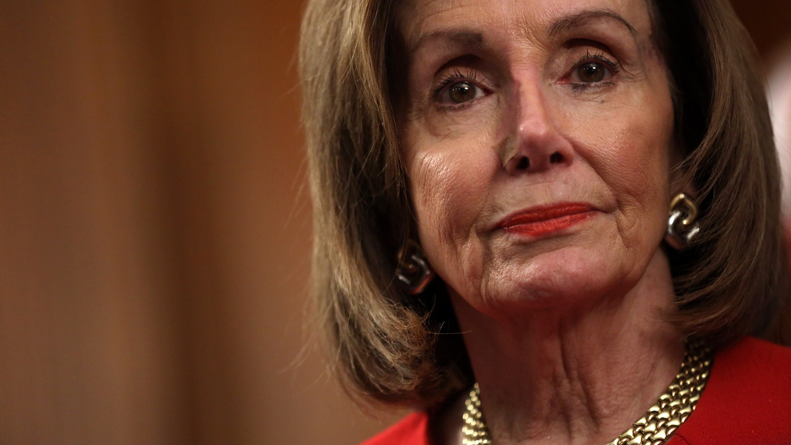 U.S. Speaker of the House Rep. Nancy Pelosi (D-CA) listens during an event at the Rayburn Room of the U.S. Capitol Dec. 19, 2019, in Washington, D.C. (Credit: Alex Wong/Getty Images)