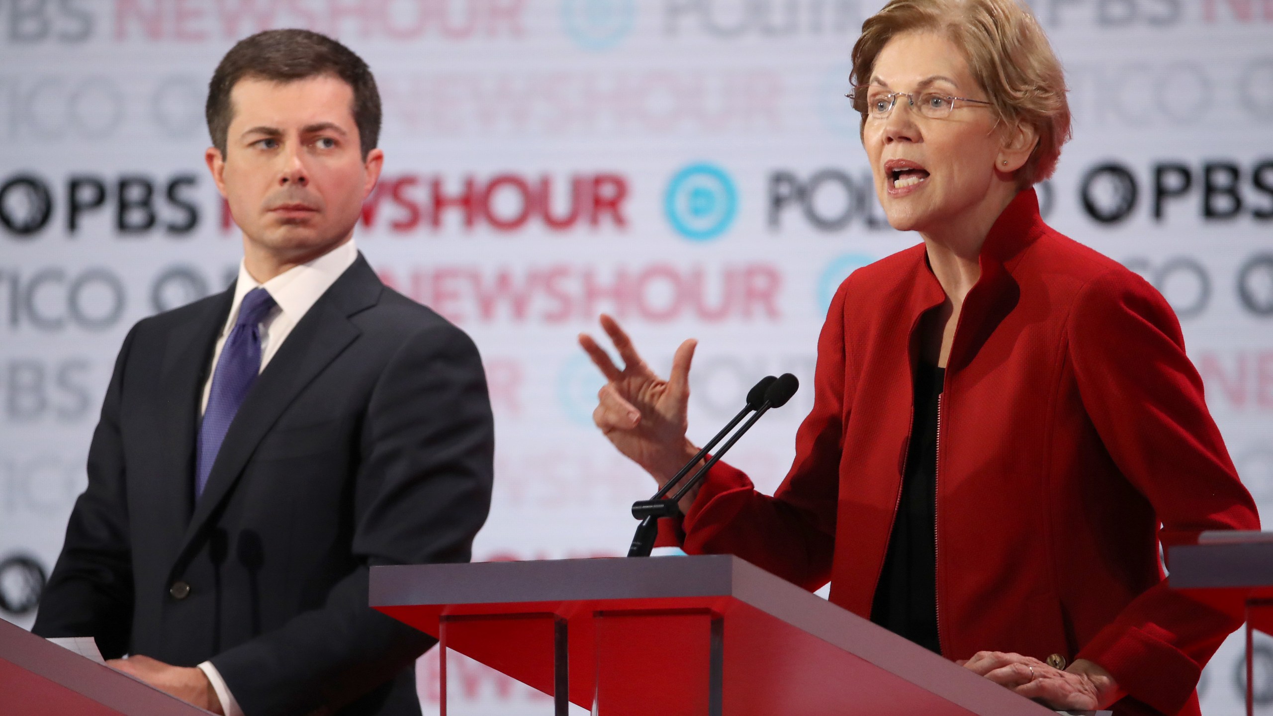 Sen. Elizabeth Warren (D-MA) speaks as South Bend, Indiana Mayor Pete Buttigieg listens during the Democratic presidential primary debate at Loyola Marymount University on Dec. 19, 2019. (Credit: Justin Sullivan/Getty Images)