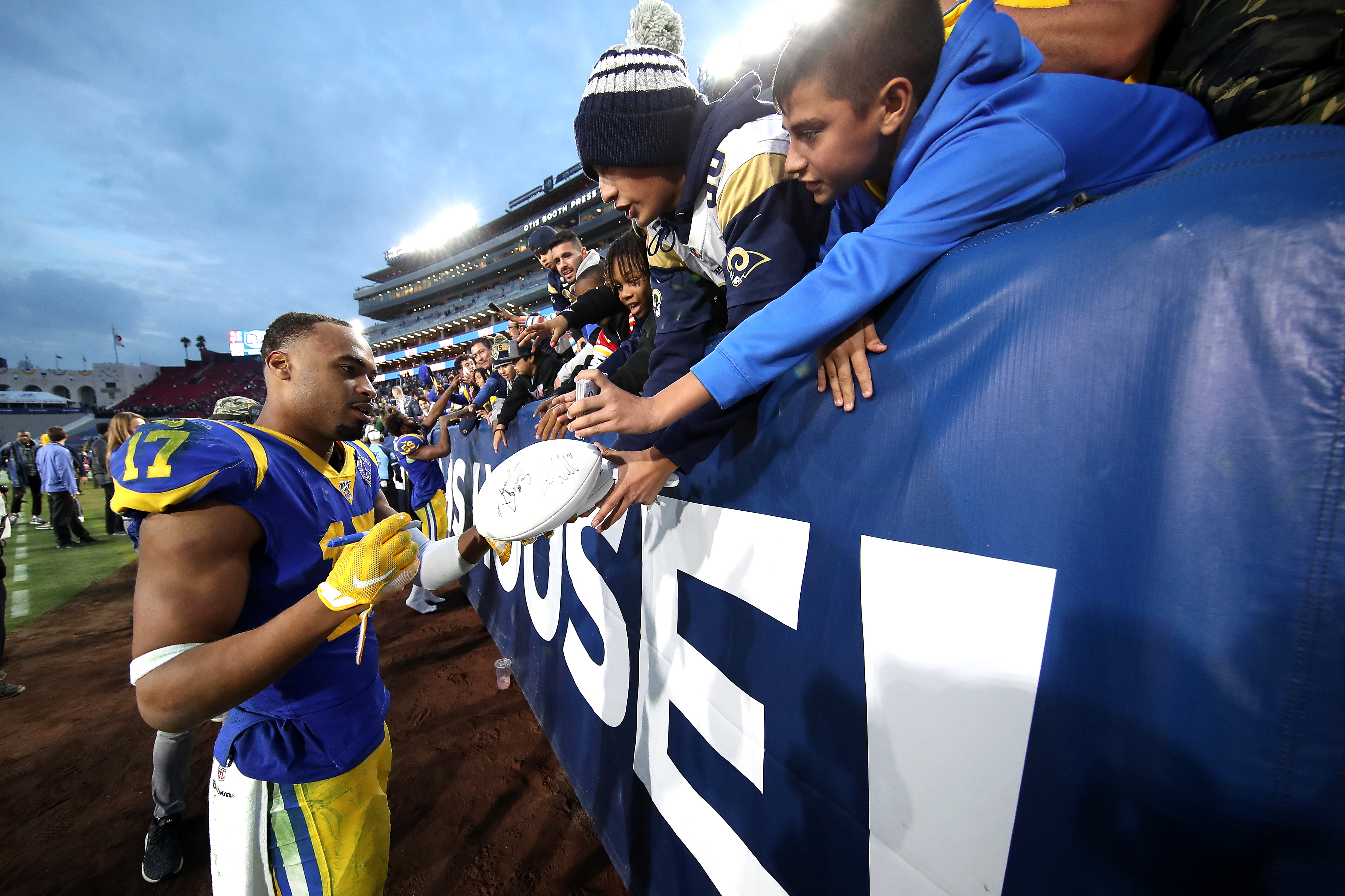 Robert Woods of the Los Angeles Rams signs autographs for fans after a game against the Arizona Cardinals at Los Angeles Memorial Coliseum on Dec. 29, 2019. (Credit: Sean M. Haffey/Getty Images)