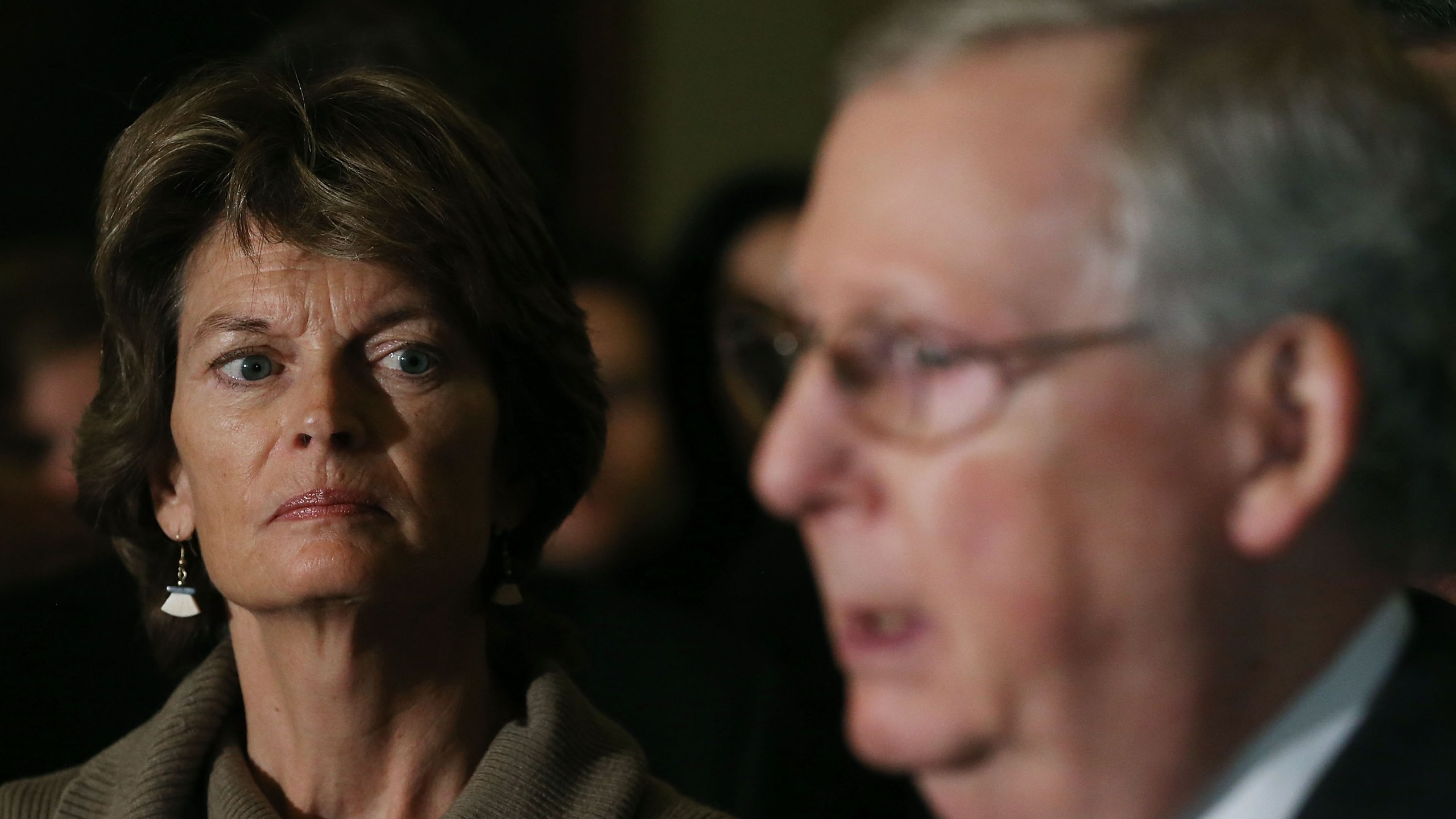 Sen. Lisa Murkowski (R-AK) listens to Senate Majority Leader Mitch McConnell (R-KY) speak to the media after the weekly Senate Policy Luncheon on Capitol Hill on Jan. 27, 2016 in Washington, D.C. (Credit: Mark Wilson/Getty Images)