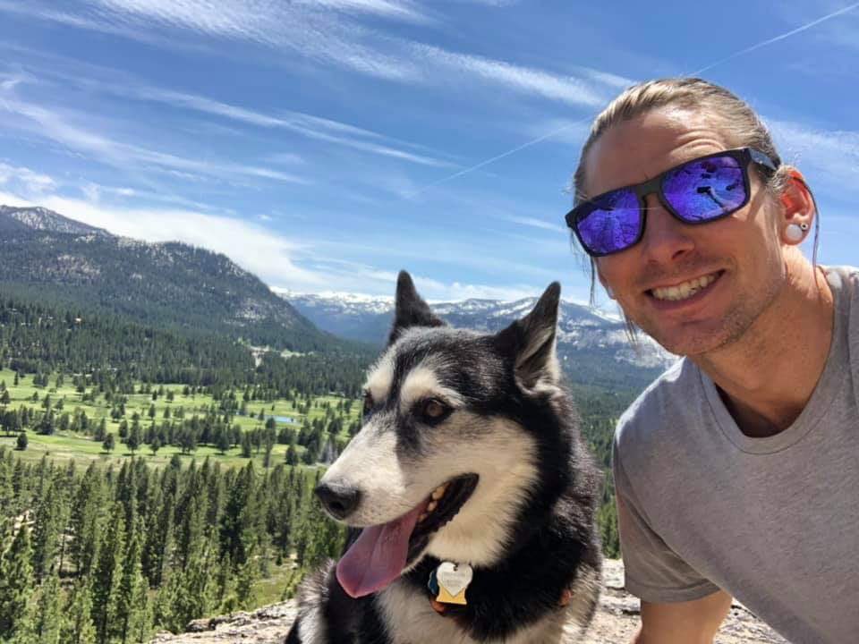 David Schmidt poses with his dog in a photo obtained by KTLA sister station KTXL in December 2019.