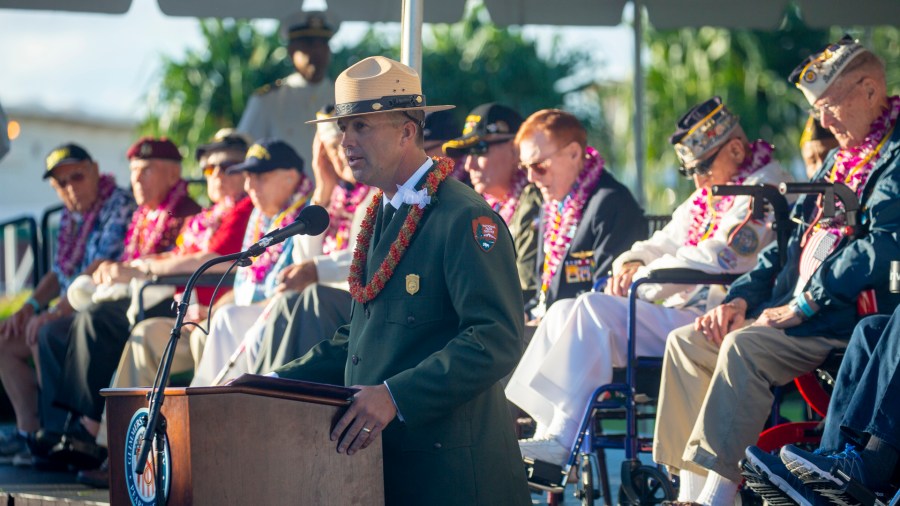 Master of Ceremonies, Chief of Interpretation Jason Blount Pearl Harbor National Memorial gives the Welcome as Pearl Harbor Commemorates the 78th Anniversary Of World War II Attacks as Pearl Harbor Commemorates the 78th Anniversary Of World War II Attacks at the Pearl Harbor National Memorial on December 7, 2019 in Honolulu, Hawaii. (Credit: Kat Wade/Getty Images)