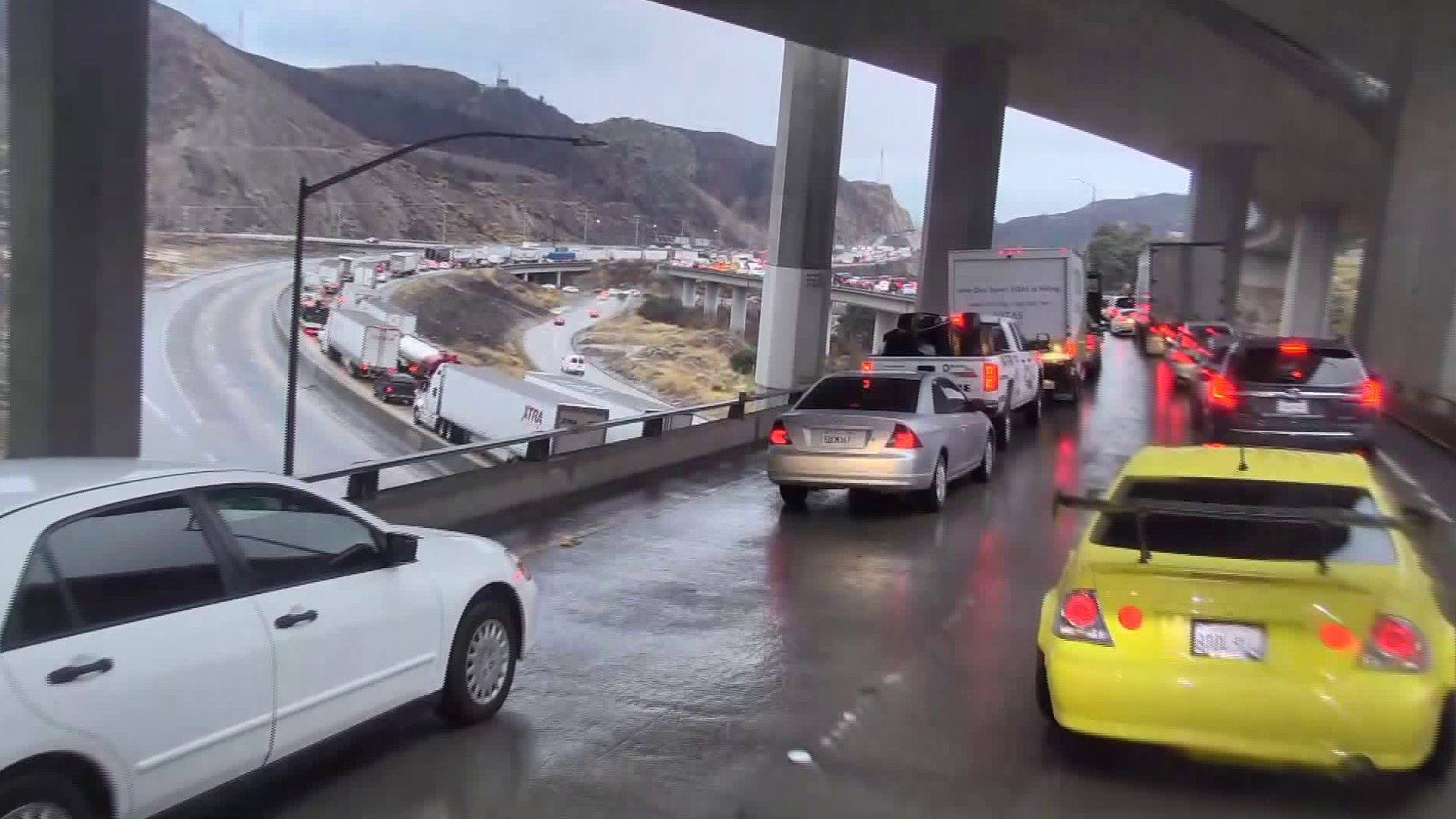 Commuters go through the 5 Freeway in the Sylmar area as rain pounded Southern California on Dec. 4, 2019. (Credit: KTLA)