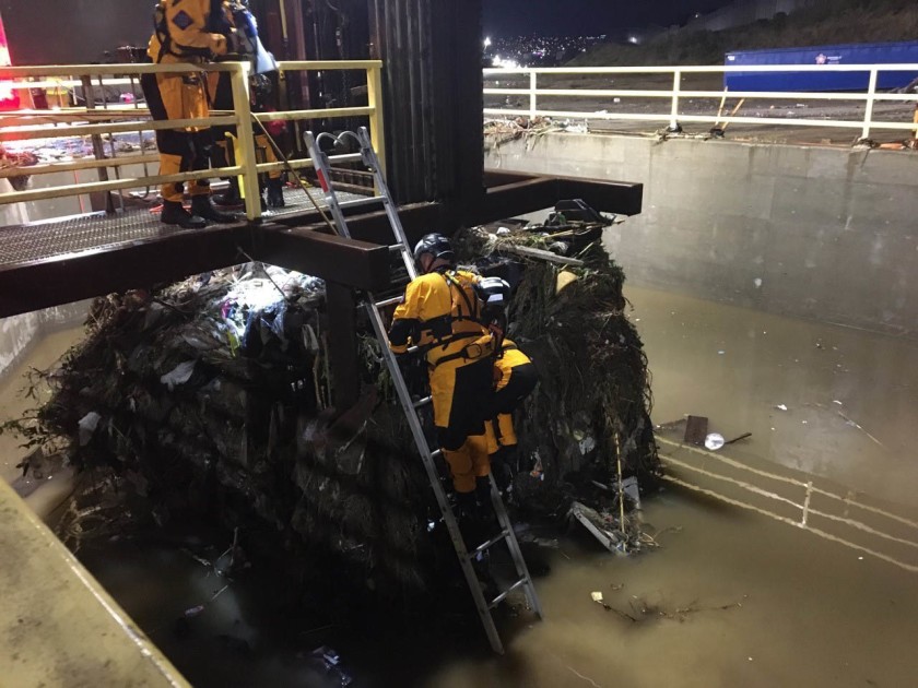 San Diego Fire Rescue worked with Border Patrol to rescue dozens of people from a drainage tube about 2 miles west of the San Ysidro Port of Entry on Nov. 28, 2019. (Credit: U.S. Border Patrol via Los Angeles Times)