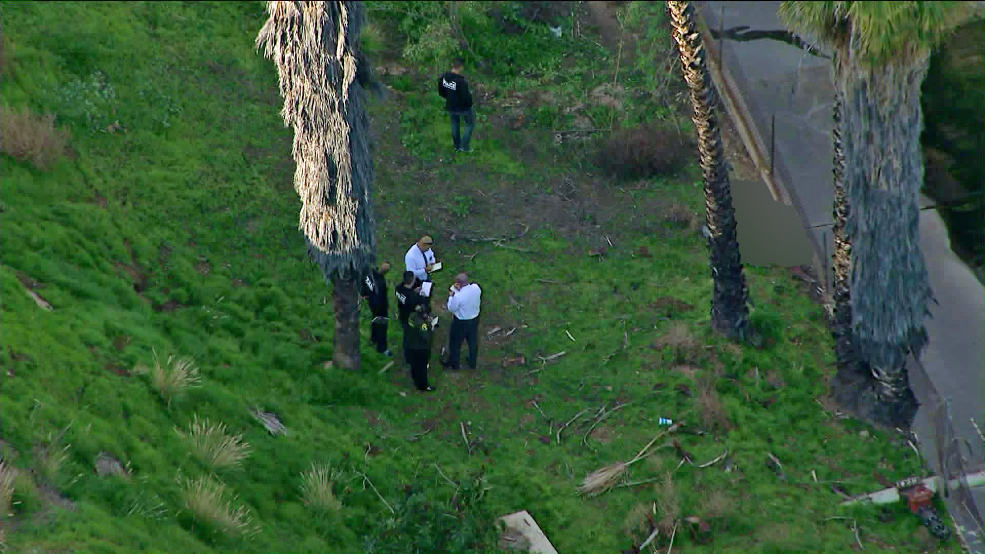 Authorities investigate the circumstances the death of a woman who was found near Almansor Park in Alhambra on Jan. 17, 2020. (Credit: KTLA)