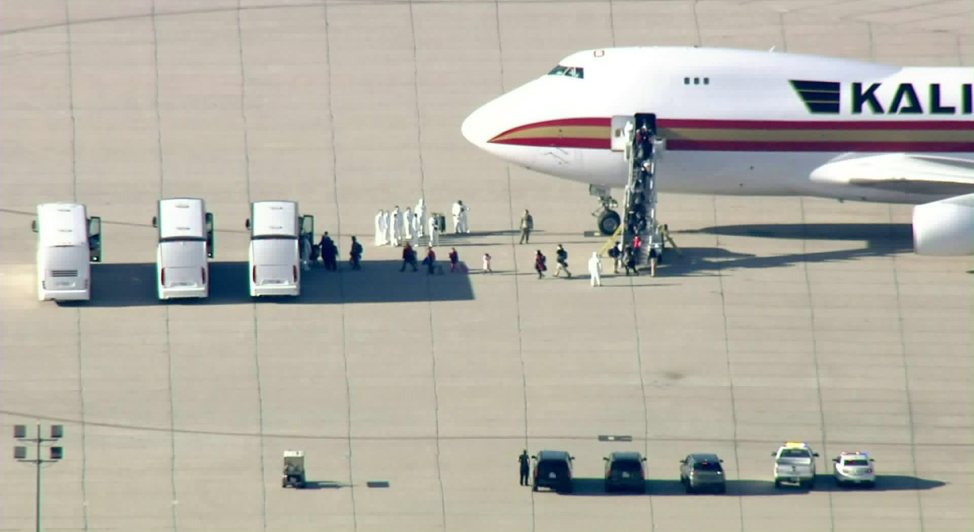 U.S. evacuees from China arrive at March Air Reserve Base near Riverside on Jan. 29, 2020, after passenger screenings in Alaska. (Credit: KTLA)