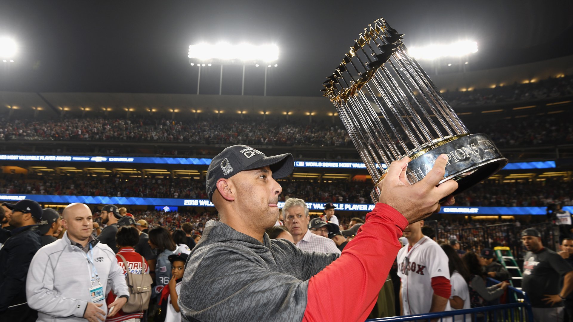 Manager Alex Cora of the Boston Red Sox celebrates with the World Series trophy after Game Five of the 2018 World Series at Dodger Stadium on October 28, 2018 in Los Angeles. (Credit: Harry How/Getty Images)