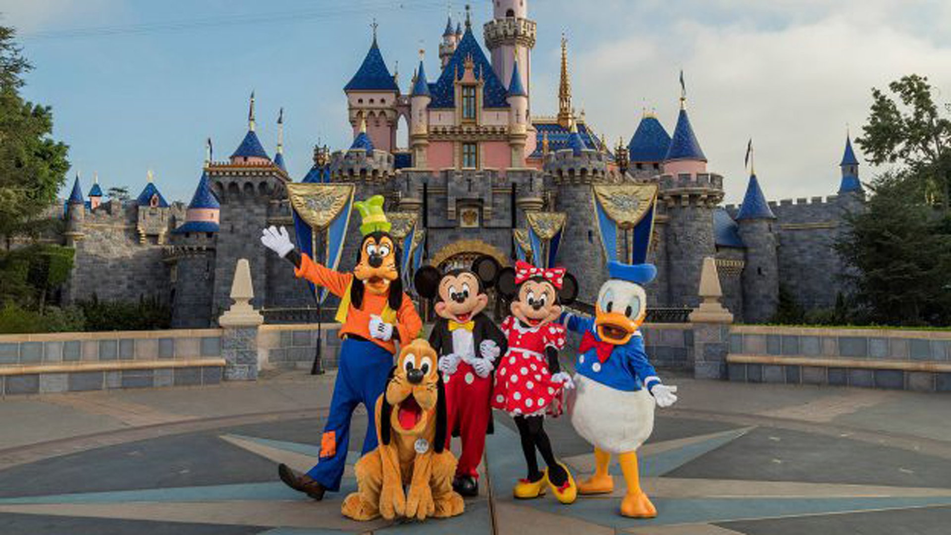 Disney characters are seen in front of Sleeping Beauty's Castle at Disneyland in a photo released by Disney on Jan. 7, 2020.