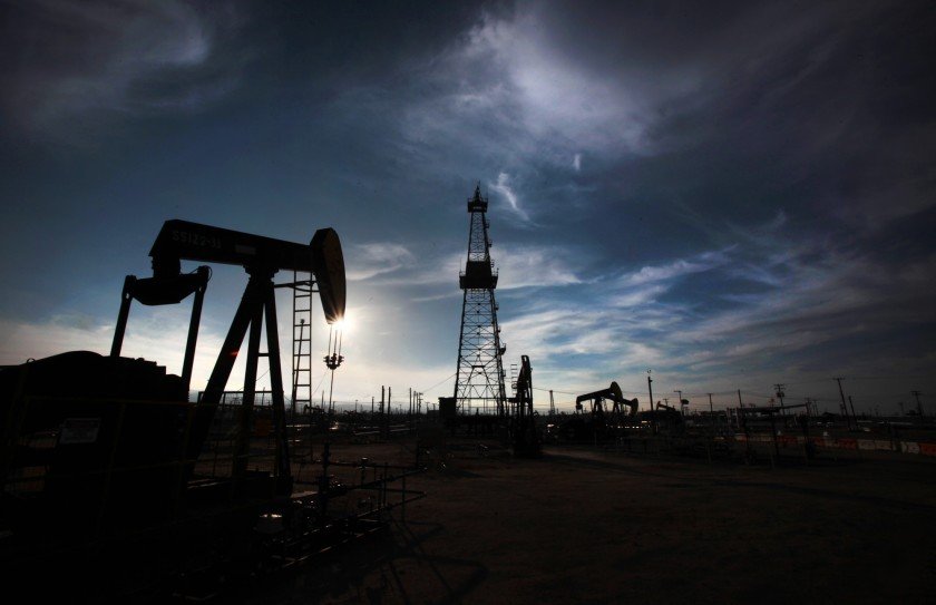 Oil pumps and drilling equipment in an oilfield in Kern County are shown in this undated photo.(Credit: Brian van der Brug/ Los Angeles Times)