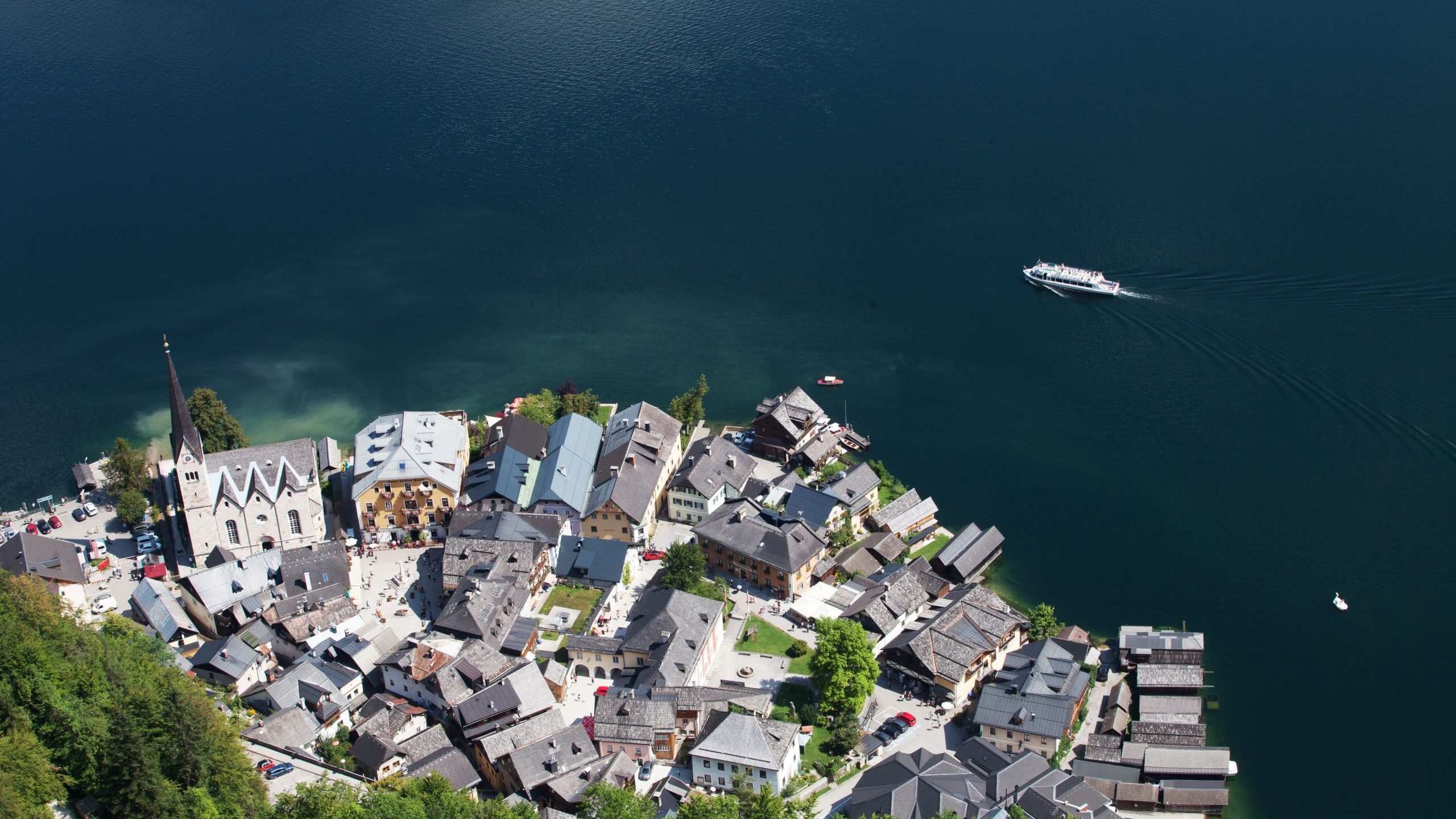 A picture taken from a suspended platform above the Hallstatt Lake shows an overview of Hallstatt, at the world heritage salt-mine in Hallstatt, Austria, on Aug. 16, 2018. (Credit: Alex Halada/AFP via Getty Images)